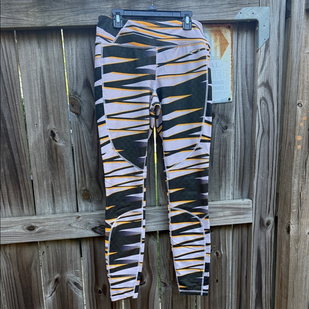 Oakley Black and Orange Patterned Leggings